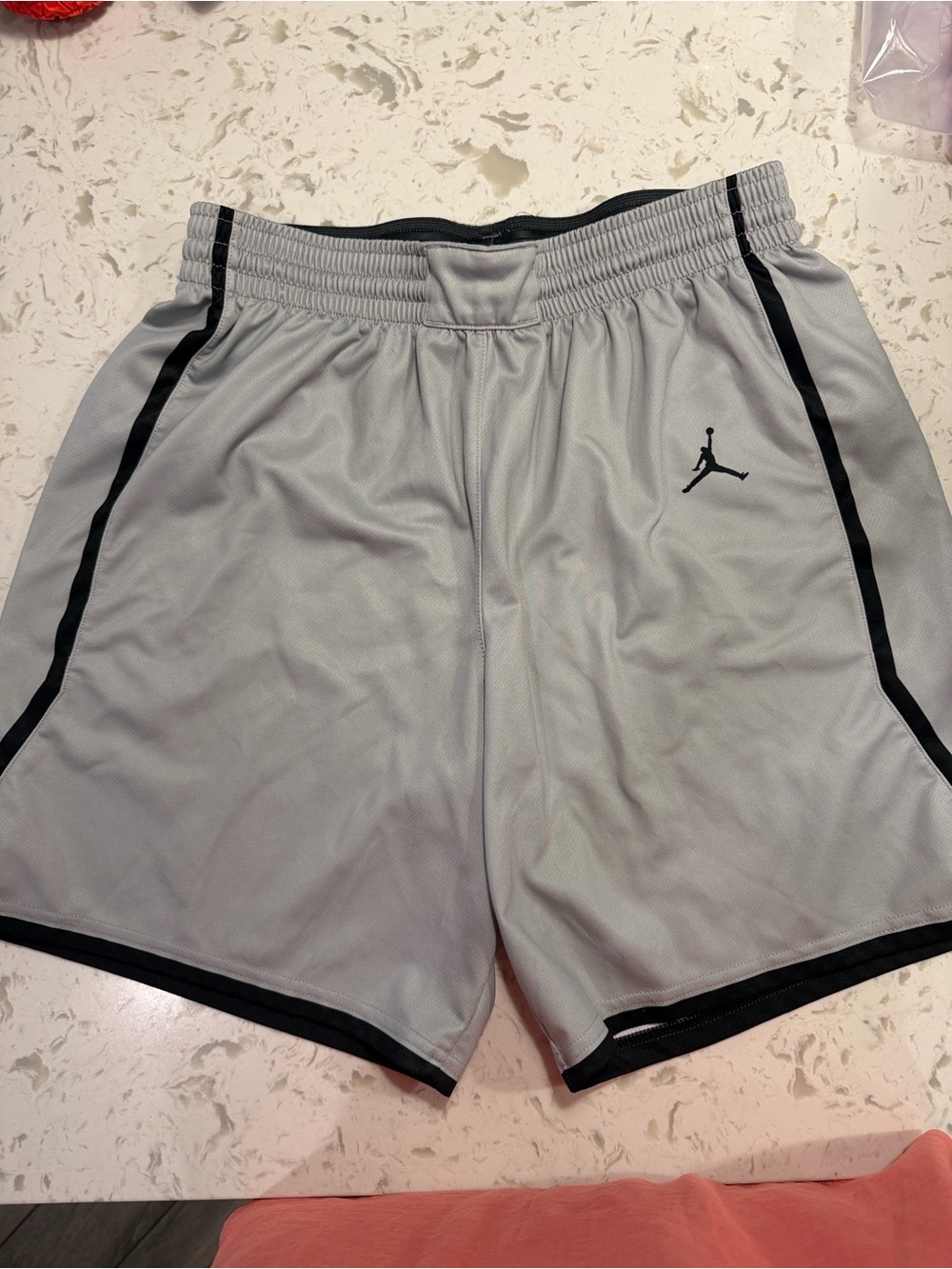 Jordan Light Gray Athletic Shorts with Black Trim